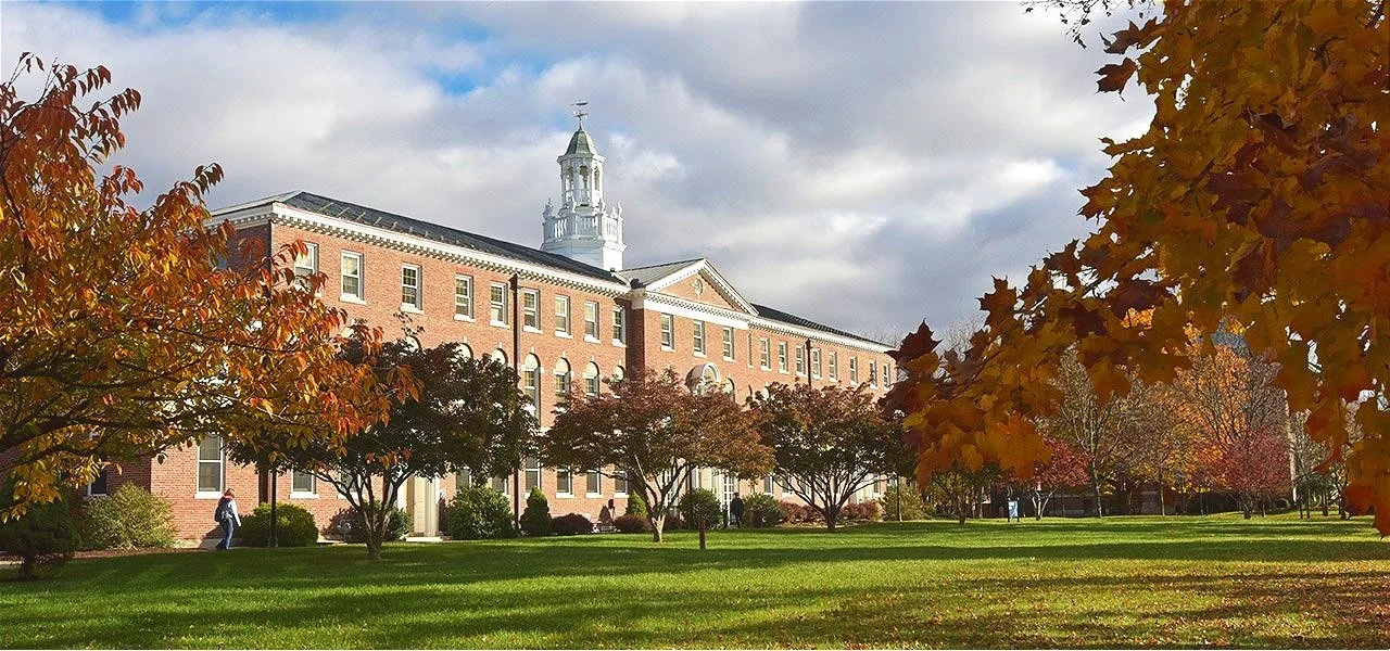 Fairfield Hall at Western Connecticut State University framed by autumn foliage